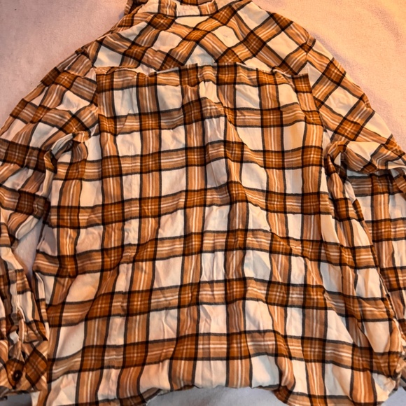 Stylish plaid button-up shirt with a classic design. Features a mix of brown and - Picture 5 of 8